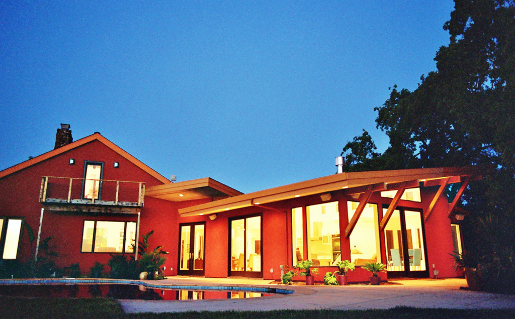 Marcus Schott Architect - dining room/kitchen/great room that frames and expands the outdoor living space between the pool andnheritage oak trees